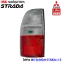 (แท้ศูนย์) เสื้อไฟท้าย MITSUBISHI STRADA  ปี 1999-2005  2สี - L ข้างซ้าย